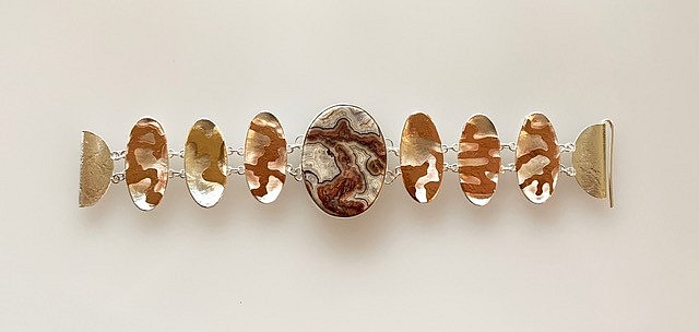 Elyse Bogart, #473 CANYON
Sterling Silver, Copper, Brass, Crazy Lace Agate
EBOG#473
$1,100
Free Domestic Shipping