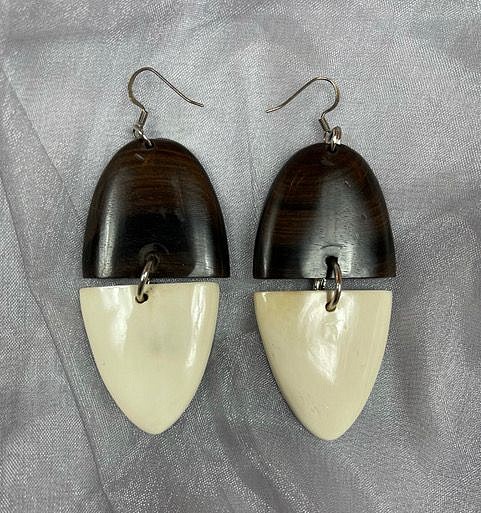 Stella Thomas Designs, STELLA 23 EBONY WOOD AND BONE EARRINGS
Ebony Wood and Bone
THOM328
$150
Gallery staff will contact you 72 hours after purchase regarding any additional shipping costs.